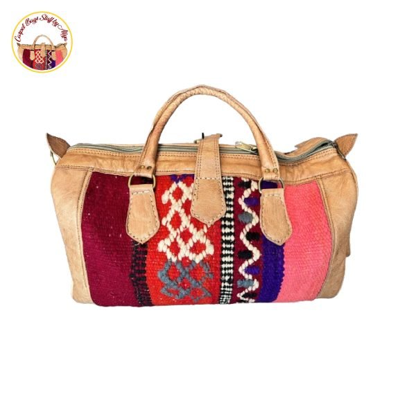 Handcrafted Noel carpet bag with a festive red and green floral design, displayed against a neutral background.